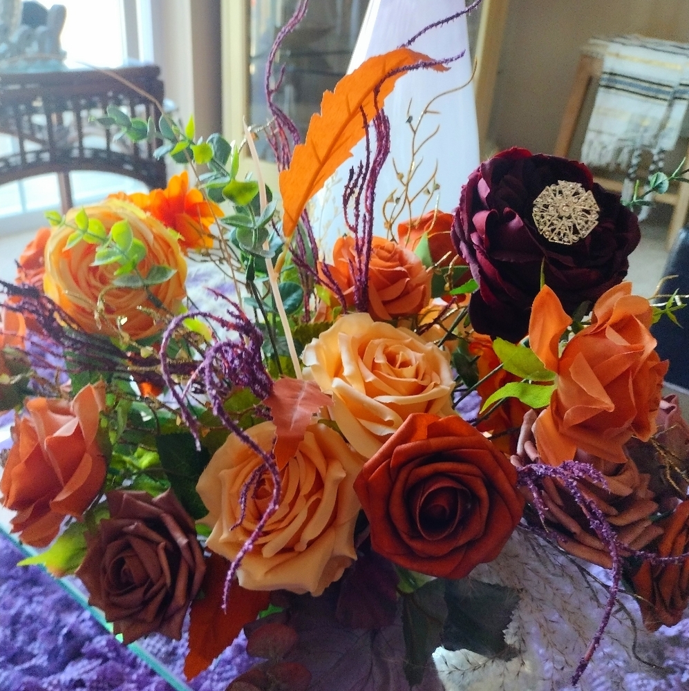 Vibrant Orange and Purple Faux Floral Accents
